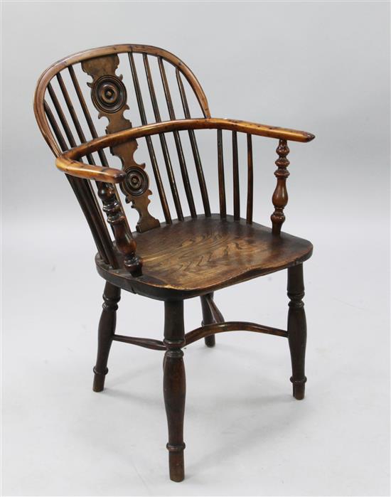 An early 19th century yew, elm and ash Windsor chair, H.2ft 10in.